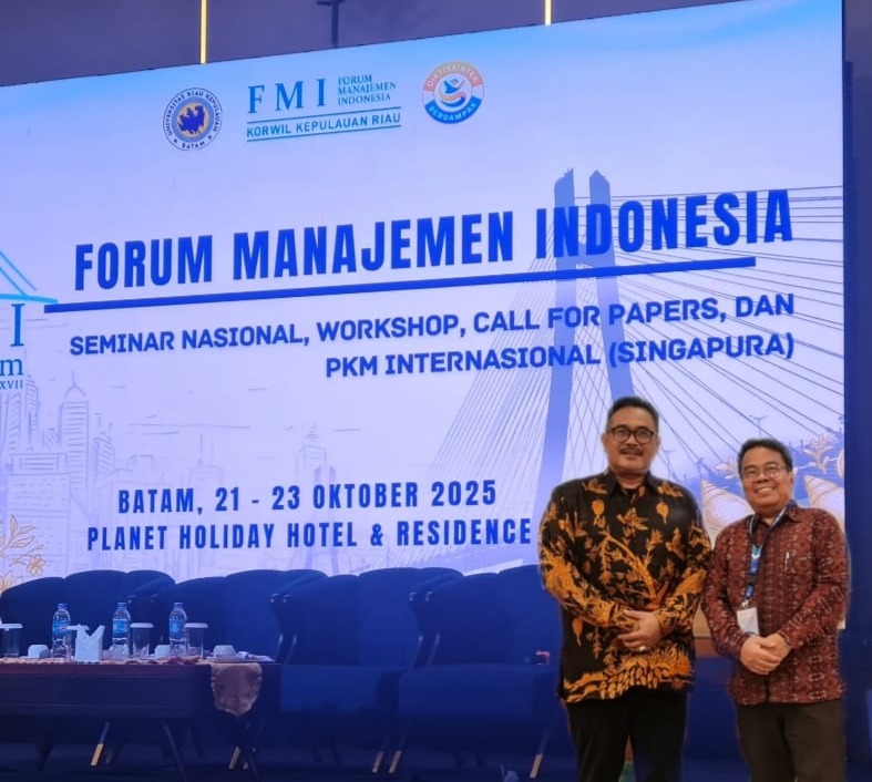 Dr. I Gede Adiputera (kiri) dan Edalmen, S.E., M.M. (kanan).